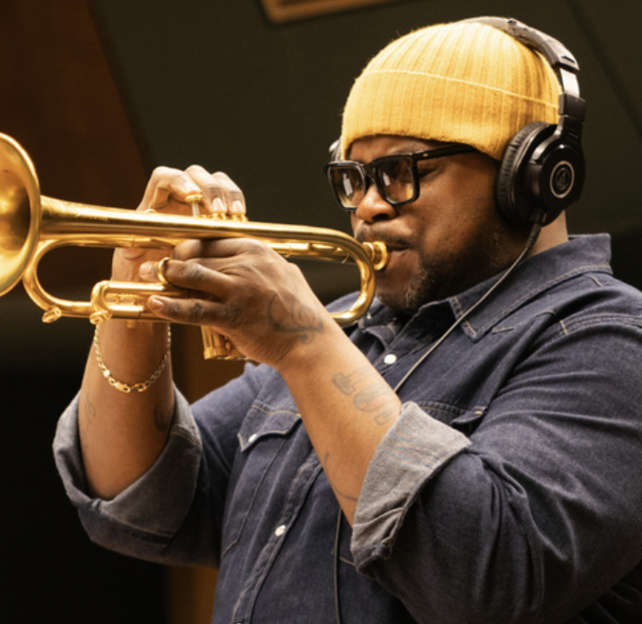 Jeremy on trumpet with headphones